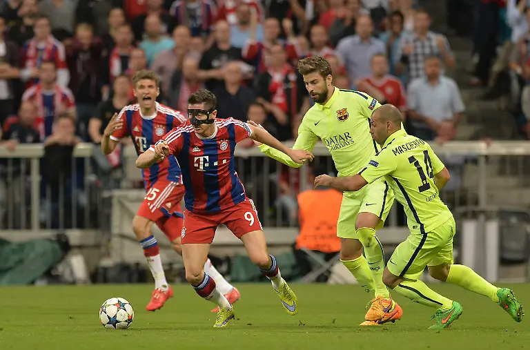 Bayern-Munich-vs-FC-Barcelona-Barca-UEFA-Champions-League-MUNICH-GERMANY-MAY-12-Robert-Lewandowski-2nd-L-of-Bayern-Munich-vies-for-the-ball-with-Gerard-Pique-2nd-R-and-Javier-Mascherano-R-of-Barcelona-during-the-UEFA-Champions-League-semi-final-second-leg-match-between-Bayern-Munich-and-FC-Barcelona-at-the-Allianz-Arena-on-May-12-2015-in-Munich-Germany-Munich-Bayern-Editorial-use-only-Please-get-in-touch-for-any-other-usage