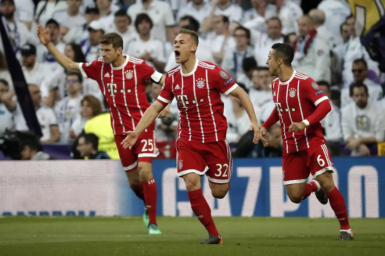 Real-Madrid-vs-FC-Bayern-Munich-UEFA-Champions-League-Semi-Final-MADRID-SPAIN-MAY-1-Joshua-Kimmich-C-of-FC-Bayern-Munich-celebrates-his-goal-during-the-UEFA-Champions-League-semi-final-second-leg-match-between-Real-Madrid-and-FC-Bayern-Munich-at-the-Santiago-Bernabeu-Stadium-in-Madrid-Spain-on-May-1-2018-Madrid-Spain-Editorial-use-only-Please-get-in-touch-for-any-other-usage