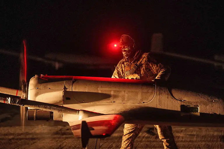 FILE-A-Ukrainian-serviceman-of-the-14th-Separate-Unmanned-Aerial-Systems-Regiment-prepares-a-long-range-drone-An-196-Liutyi-before-takeoff-in-undisclosed-location-Ukraine-Tuesday-Oct-14-2025
