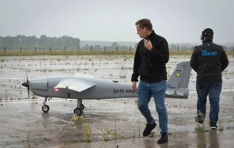 Men-prepare-to-launch-a-Ukraine-made-UJ-22-Airborne-a-multi-purpose-unmanned-aerial-system-in-Kyiv-region-Ukraine-Tuesday-Aug-2-2022