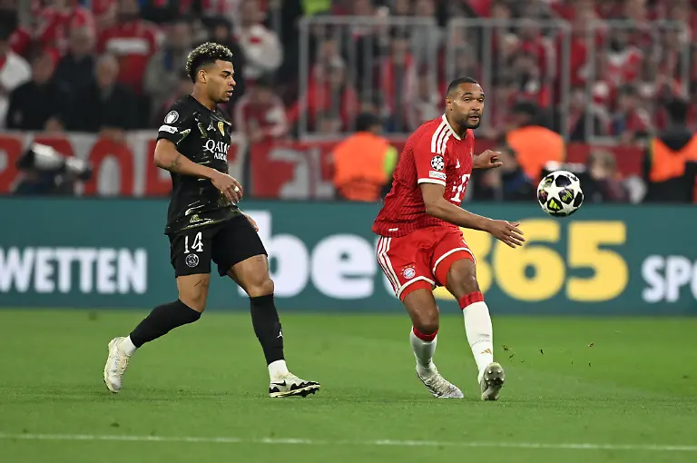 MUNICH-GERMANY-MAY6-Desire-Douse-of-Paris-Saint-Germain-in-action-against-Jonathan-Tah-of-FC-Bayern-Munich-during-the-UEFA-Champions-League-Semi-Final-Second-Leg-match-between-FC-Bayern-Munich-and-Paris-Saint-Germain-at-Football-Arena-Munich-in-Munich-Germany-on-May-6-2026