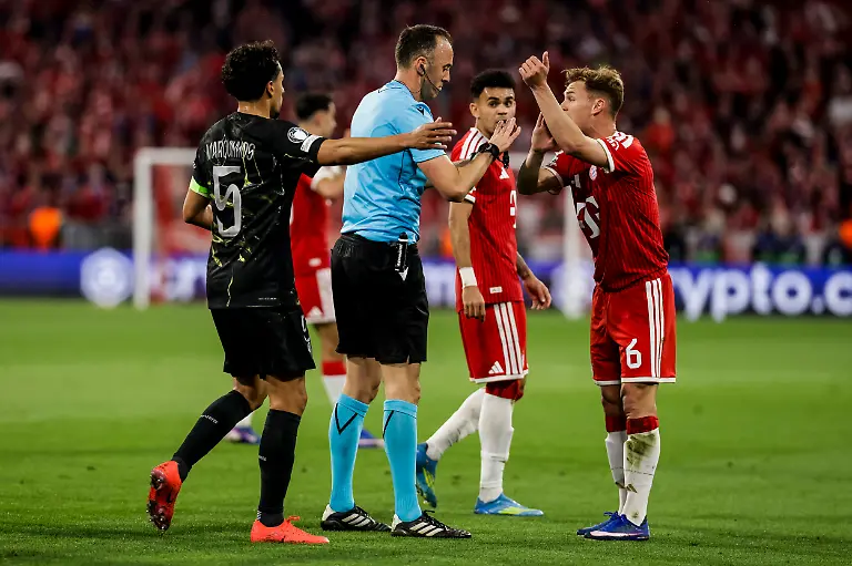 MUNICH-GERMANY-MAY-6-Joshua-Kimmich-FC-FC-Bayern-Munich-6-in-discussion-with-referee-Joao-Pinheiro-Marquinhos-FC-Paris-Saint-Germain-5-joins-during-the-UEFA-Champions-League-Semi-Final-between-FC-FC-Bayern-Munich-vs-Paris-Saint-Germain-at-Allianz-Arena-at-Semi-Finals-2nd-leg-of-the-UEFA-Champions-League-on-May-6-2026-in-Munich-Germany
