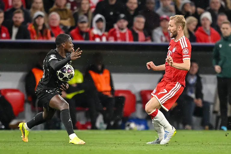 Nuno-Mendes-Paris-Saint-Germain-FC-and-Konrad-Laimer-FC-Bayern-Muenchen-battle-for-the-ball-during-the-UEFA-Champions-League-2025-26-Semi-Final-Second-Leg-match-between-FC-Bayern-Muenchen-and-Paris-Saint-Germain-at-Football-Arena-Munich-on-May-6-2026-in-Munich-Germany