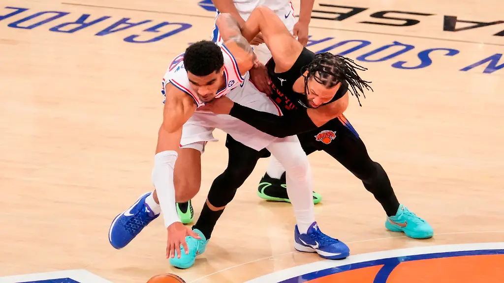 Philadelphia-76ers-forward-Dominick-Barlow-25-fights-for-control-of-the-ball-with-New-York-Knicks-guard-Jalen-Brunson-11-during-the-second-half-of-Game-2-in-a-second-round-NBA-basketball-playoffs-series-Wednesday-May-6-2026-in-New-York
