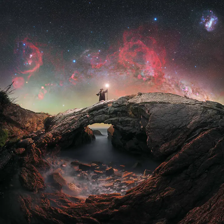 When-I-first-discovered-this-location-I-immediately-envisioned-creating-something-special-beneath-the-night-sky-However-upon-arriving-after-dark-I-found-that-a-seal-had-settled-exactly-where-I-had-planned-to-set-up-my-tripod-It-showed-little-interest-in-moving-and-judging-by-how-worn-and-polished-the-rock-was-it-was-clearly-one-of-its-preferred-resting-spots-Eventually-the-seal-shifted-slightly-to-the-side-remaining-within-the-scene-for-the-duration-of-the-shoot-It-can-still-be-seen-in-the-final-image-for-those-who-look-closely-adding-an-unexpected-and-memorable-element-to-the-composition-Given-the-complexity-of-the-scene-I-knew-the-final-image-would-require-a-significant-amount-of-work-Over-the-following-weeks-starting-in-November-I-returned-whenever-possible-to-collect-the-necessary-data-for-this-panorama-carefully-building-the-image-piece-by-piece-under-the-night-sky