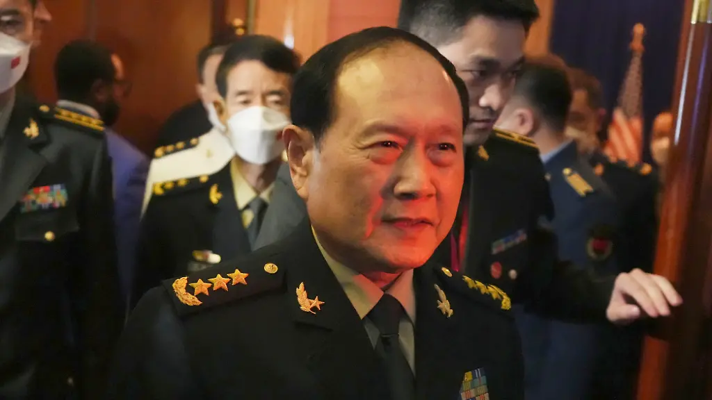 FILE-Chinese-Defense-Minister-Gen-Wei-Fenghe-front-walks-out-after-a-meeting-with-U-S-Secretary-of-Defense-Lloyd-J-Austin-III-at-the-venue-of-the-Association-of-Southeast-Asian-Nations-ASEAN-Defense-Ministers-Meeting-ADMM-in-Siem-Reap-Cambodia-on-Nov-22-2022-China-has-expelled-two-former-defense-ministers-from-the-ruling-Communist-Party-over-accusations-of-corruption-that-are-likely-to-lead-to-sentences-of-life-in-prison-The-Defense-Ministry-on-Thursday-June-27-2024-said-Li-Shangfu-abused-his-authority-to-enrich-himself-by-taking-bribes-in-exchange-for-granting-favors-Li-s-predecessor-Wei-Fenghe-was-also-accused-on-similar-charges