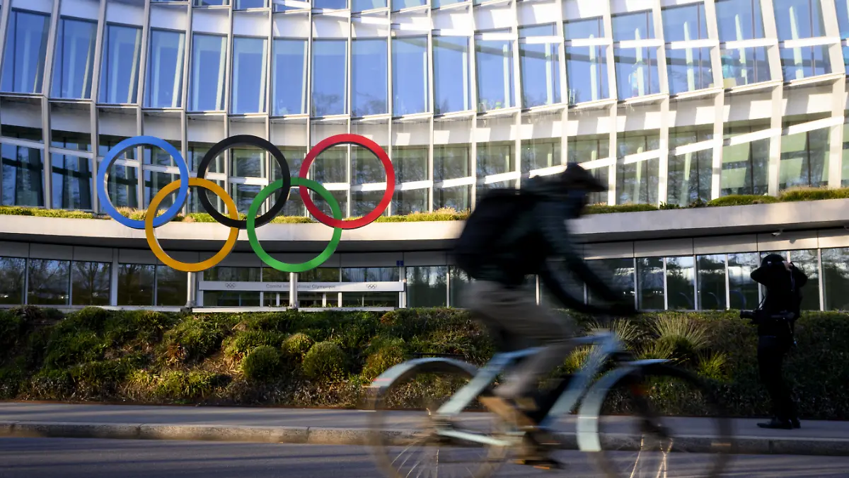 Olympic-Rings-are-pictured-in-front-of-The-Olympic-House-headquarters-of-the-International-Olympic-Committee-IOC-at-the-opening-at-the-opening-of-the-executive-board-meeting-of-the-International-Olympic-Committee-IOC-in-Lausanne-Switzerland-Tuesday-March-28-2023-The-International-Olympic-Committee-IOC-Executive-Board-is-set-to-discuss-the-results-of-consultations-regarding-the-status-of-athletes-from-Russia-and-Belarus-in-its-meeting-set-to-run-until-March-30