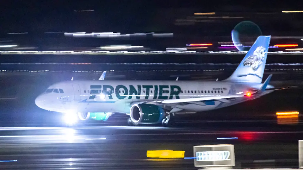 Frontier-Airlines-Airbus-A320neo-passenger-aircraft-spotted-on-accelerating-on-the-runway-for-take-off-at-Ronald-Reagan-Washington-National-Airport-DCA-in-Virginia-serving-Washington-DC-The-departing-Airbus-A320-NEO-airplane-of-the-Ultra-Low-Cost-Airline-spotted-during-the-night-has-the-registration-tail-number-N389FR-the-name-Rocky-the-Saw-Whet-Owl-and-is-powered-by-2x-jet-engines-CFMI-LEAP-1A26-The-American-budget-carrier-has-headquarters-in-Denver-Colorado-operating-120-destinations-in-the-United-States-Caribbean-Mexico-and-Central-America-with-a-fleet-of-150-planes