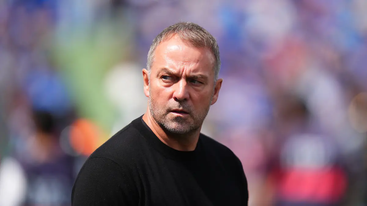 Barcelona-s-head-coach-Hansi-Flick-enters-to-the-pitch-prior-to-the-Spanish-La-Liga-soccer-match-between-Getafe-and-Barcelona-in-Getafe-Spain-Saturday-April-25-2026