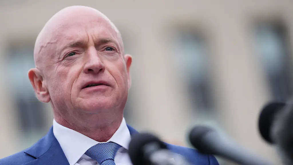Sen-Mark-Kelly-D-Ariz-speaks-with-reporters-outside-the-E-Barrett-Prettyman-Federal-Courthouse-Thursday-May-7-2026-in-Washington