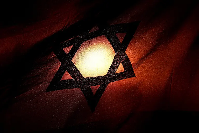 Sunset-seen-through-Israeli-flag-in-Tel-Aviv-Israel-April-23-2026