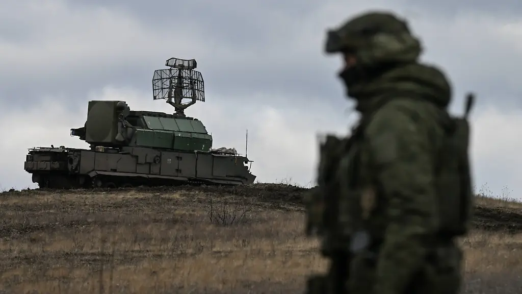 Russia-Ukraine-Military-Operation-Air-Defence-9117096-04-03-2026-A-Russian-serviceman-of-the-Tsentr-Centre-Group-of-Forces-stands-guard-near-a-Tor-M1-surface-to-air-missile-system-at-the-Krasnoarmeysk-Pokrovsk-sector-of-the-front-line-amid-Russia-s-military-operation-in-Ukraine