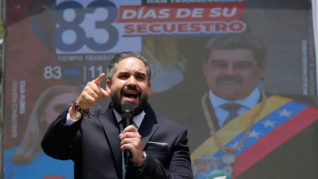 National-Assembly-lawmaker-Nicolas-Maduro-Guerra-the-son-of-former-Venezuelan-President-Nicolas-Maduro-speaks-during-a-government-organized-event-to-watch-his-father-and-his-wife-Cilia-Flores-appear-in-a-New-York-court-on-a-screen-in-Caracas-Venezuela-Thursday-March-26-2026