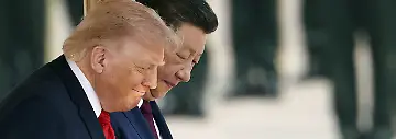 U-S-President-Donald-Trump-front-alongside-Chinese-President-Xi-Jinping-attends-a-welcome-ceremony-at-the-Great-Hall-of-the-People-in-Beijing-on-May-14-2026