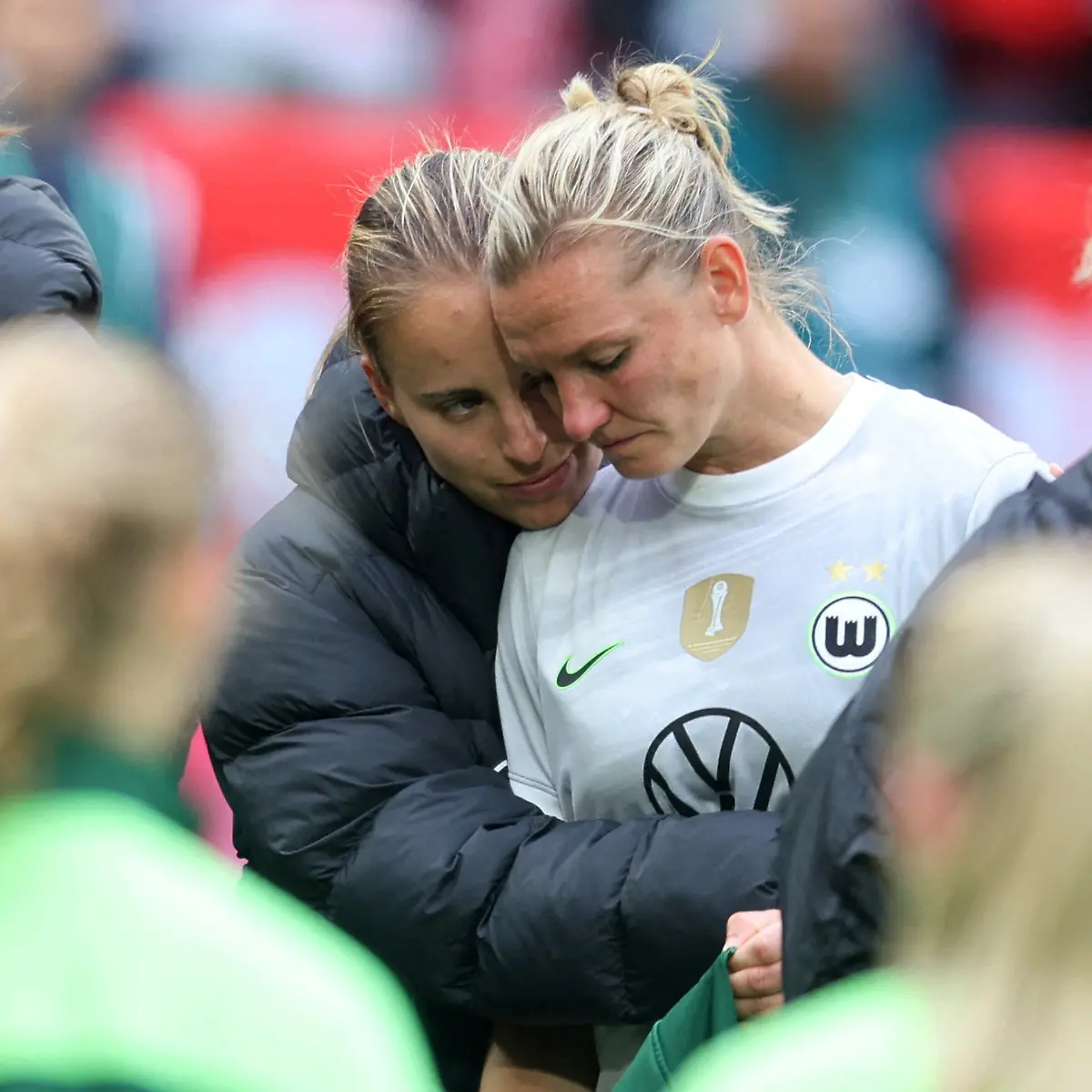 Soccer-Football-DFB-Cup-Women-s-Final-VfL-Wolfsburg-v-Bayern-Munich-RheinEnergieStadion-Cologne-Germany-May-14-2026-VfL-Wolfsburg-s-Luca-Papp-consoles-Alexandra-Popp-after-losing-the-final-REUTERS-Leon-Kuegeler-DFL-REGULATIONS-PROHIBIT-ANY-USE-OF-PHOTOGRAPHS-AS-IMAGE-SEQUENCES-AND-OR-QUASI-VIDEO