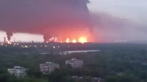 epi_1014377211_REUTERSFOTO_2026-05-15T105628Z 1487522145 RC2K9LAGIP4G RTRMADP 3 UKRAINE-CRISIS-RUSSIA-REFINERIES.JPG_FILE PHOTO_ Fire and