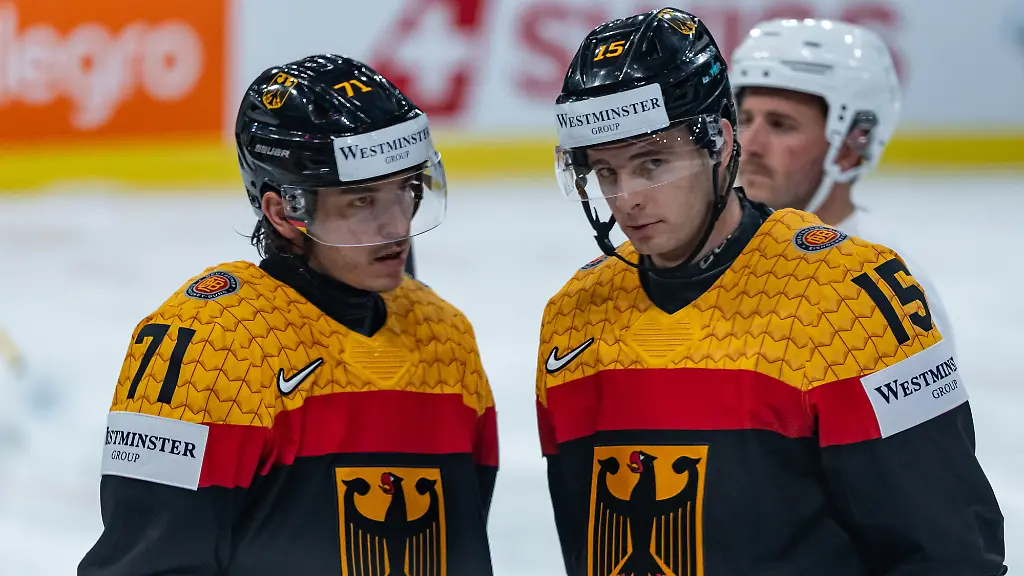 ZURICH-SWITZERLAND-MAY-17-Daniel-Fischbuch-Germany-71-and-Stefan-Loibl-Germany-15-during-the-Preliminary-Round-Group-A-Match-15-between-Germany-and-Latvia-at-the-IIHF-Ice-Hockey-World-Championship-2026-Swiss-Life-Arena-on-May-17-2026-in-Zurich-Switzerland