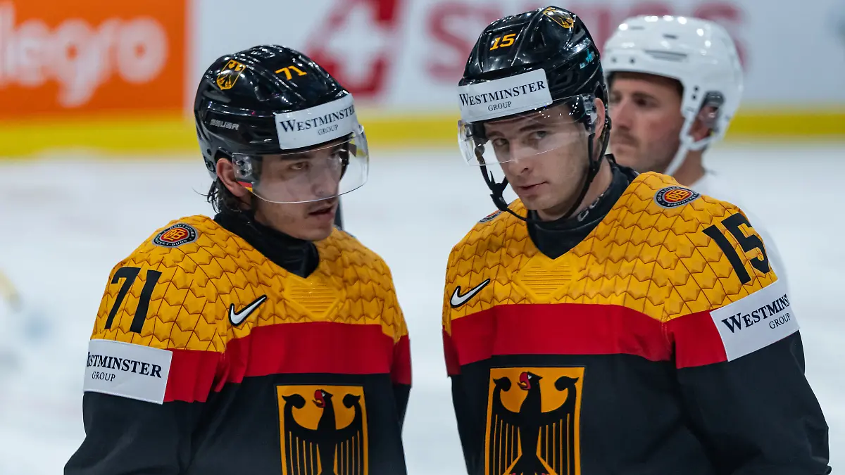 ZURICH-SWITZERLAND-MAY-17-Daniel-Fischbuch-Germany-71-and-Stefan-Loibl-Germany-15-during-the-Preliminary-Round-Group-A-Match-15-between-Germany-and-Latvia-at-the-IIHF-Ice-Hockey-World-Championship-2026-Swiss-Life-Arena-on-May-17-2026-in-Zurich-Switzerland