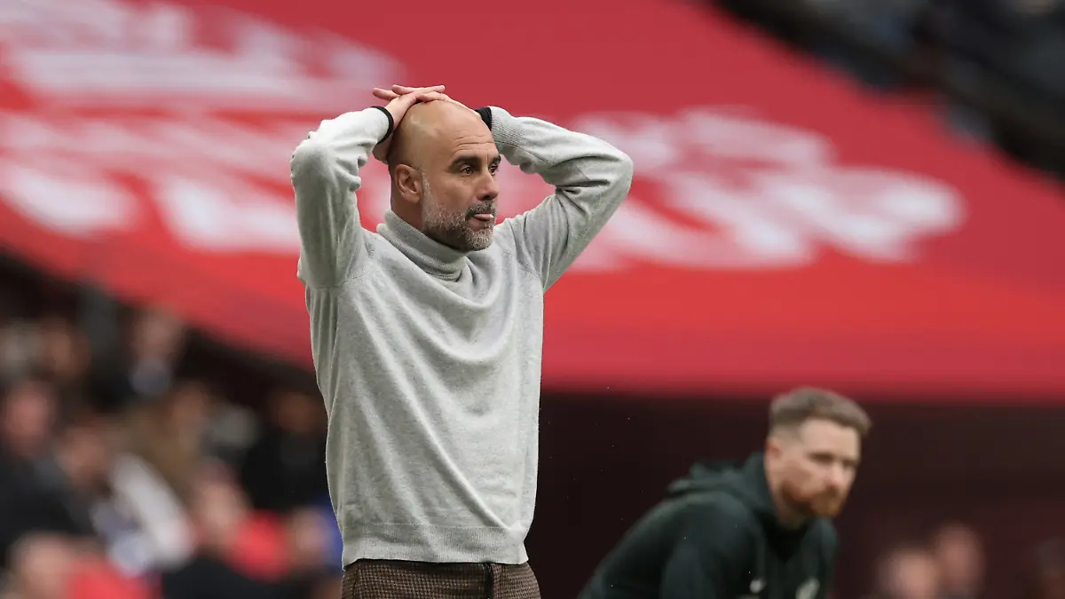 Manchester-City-s-head-coach-Pep-Guardiola-reacts-during-the-English-FA-Cup-final-soccer-match-between-Chelsea-and-Manchester-City-in-London-Saturday-May-16-2026