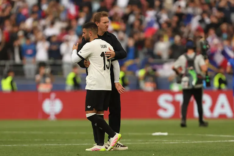 Deniz-Undav-Deutschland-und-Trainer-Julian-Nagelsmann-Deutschland-shake-hands-during-the-UEFA-Nations-League-2025-third-place-match-between-Germany-and-France-at-Stuttgart-Arena-on-June-8-2025-in-Stuttgart-Germany