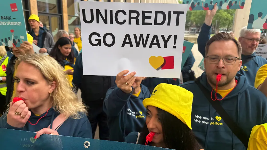 Commerzbank-staff-protest-before-the-annual-shareholders-meeting-in-Wiesbaden-Germany-May-20-2026-as-the-German-bank-fights-for-independence-following-Italy-s-UniCredit-takeover-bid