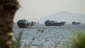 epi_1014829522_REUTERSFOTO_2026-05-22T121327Z 685117829 RC24ELAP28RR RTRMADP 3 IRAN-CRISIS-OMAN-HORMUZ.JPG_Vessels sail through