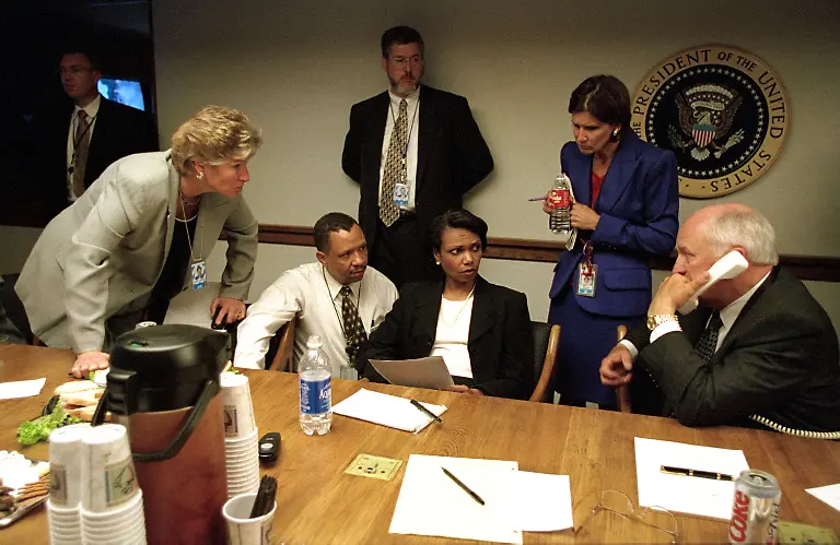 04-November-2025-Dick-Cheney-Dies-at-84-FILE-PHOTO-Meeting-in-the-Presidential-Emergency-Operations-Center-U-S-Vice-President-Dick-Cheney-confers-with-President-George-W-Bush-via-telephone-Also-pictured-are-Counselor-Karen-Hughes-far-left-National-Security-Advisor-Dr-Condoleezza-Rice-seated-right-and-Counselor-to-the-Vice-President-Mary-Matalin-standing-right-at-the-White-House-in-Washington-D-C-on-Tuesday-September-11-2001-Mandatory-Credit-David-Bohrer-White-House-via-CNP