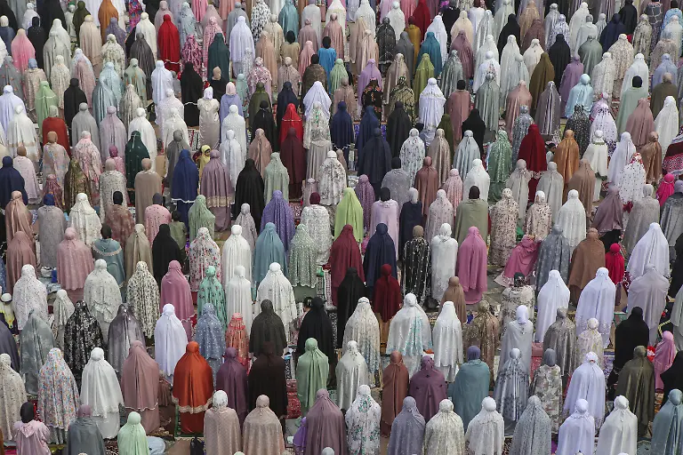 WEST-JAVA-INDONESIA-JUNE-6-Muslims-attend-Eid-Al-Adha-Feast-of-Sacrifice-prayer-at-the-Dian-Al-Mahri-Mosque-also-known-as-Golden-Dome-Mosque-in-Depok-West-Java-Indonesia-on-June-6-2025-Muslims-worldwide-celebrate-Eid-Al-Adha-to-commemorate-the-holy-Prophet-Ibrahim-s-Prophet-Abraham-readiness-to-sacrifice-his-son-as-a-sign-of-his-obedience-to-God-during-which-they-sacrifice-permissible-animals-generally-goats-sheep-and-cows-Eid-al-Adha-is-the-one-of-two-most-important-holidays-in-the-Islamic-calendar-with-prayers-and-the-ritual-sacrifice-of-animals