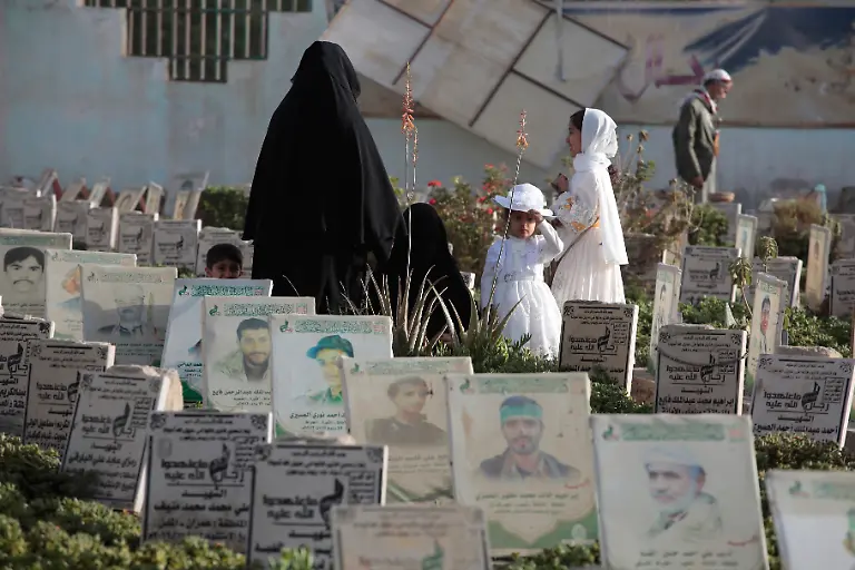Yemenis-visit-the-graves-of-their-relatives-on-the-first-day-of-Eid-al-Adha-in-Sanaa-Yemen-Friday-June-6-2025