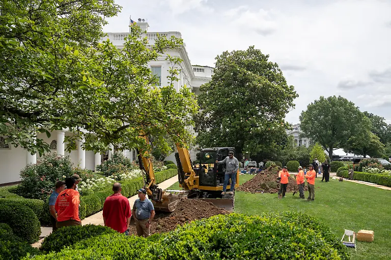A-crew-works-in-the-Rose-Garden-of-the-White-House-for-Trumps-projects-to-pave-over-the-Rose-Garden-grass-area-at-the-White-House-in-Washington-DC-on-Tuesday-June-10-2025