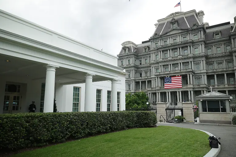 WASHINGTON-DC-MAY-07-The-Eisenhower-Executive-Office-Building-sits-near-the-West-Wing-of-the-White-House-on-May-7-2026-in-Washington-DC-The-Trump-administration-is-proposing-to-paint-the-gray-granite-exterior-the-historical-building-in-white