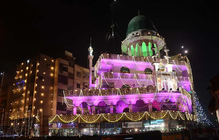 151224-KARACHI-Dec-24-2015-A-mosque-is-illuminated-during-celebrations-ahead-of-Eid-e-Milad-un-Nabi-marking-the-birth-anniversary-of-Islam-s-Prophet-Mohammed-in-southern-Pakistani-port-city-of-Karachi-Dec-23-2015