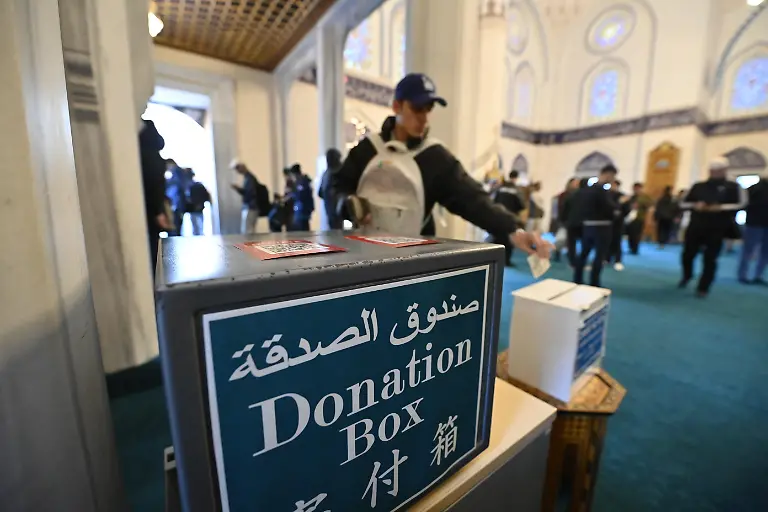 TOKYO-JAPAN-MARCH-20-Muslims-in-Japan-give-charity-called-Zakat-al-Fitr-as-they-celebrate-Eid-Ul-Fitr-marking-the-joyous-conclusion-of-Ramadan-s-month-long-fasting-at-Tokyo-Camii-on-March-20-2026-in-Tokyo-Japan