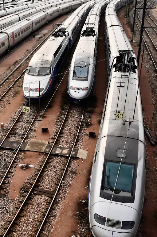 TGV-high-speed-trains-stand-stationery-on-tracks-outside-the-Gare-de-Lyon-tran-station-on-April-4-2018-in-Paris-on-the-second-day-of-three-months-of-rolling-rail-strikes-by-the-staff-of-French-public-railways-service-SNCF-Staff-at-state-rail-operator-SNCF-walked-off-the-job-from-7-00-pm-1700-GMT-on-April-2-the-first-in-a-series-of-walkouts-affecting-everything-from-energy-to-garbage-collection-The-rolling-rail-strikes-set-to-last-until-June-28-are-being-seen-as-the-biggest-challenge-yet-to-the-President-s-sweeping-plans-to-shake-up-France-and-make-it-more-competitive