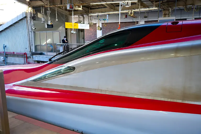 February-28-2023-Tokyo-Japan-A-JR-East-E6-series-E6A-A-A-Shinkansen-built-by-Hitachi-and-Kawasaki-Heavy-Industries-at-Tokyo-Station-with-service-on-the-TAAhoku-Shinkansen-to-Shin-Aomori-station-Tokyo-Station-A-AA-A-AoA-A-A-a-is-a-historic-transportation-hub-in-Japan-serving-as-a-terminal-for-shinkansen-and-local-trains-It-s-also-a-shopping-and-dining-destination-with-restaurants-boutiques-and-a-hotel-in-its-renovated-brick-main-building-Shinkansen-A-aA-A-A-A-A-A-A-is-Japan-s-high-speed-bullet-train-network-connecting-major-cities-Known-for-speed-efficiency-and-comfort-it-is-one-of-the-busiest-and-most-advanced-rail-systems-in-the-world-High-speed-rail-Japan-economy-Eastern-asia-business