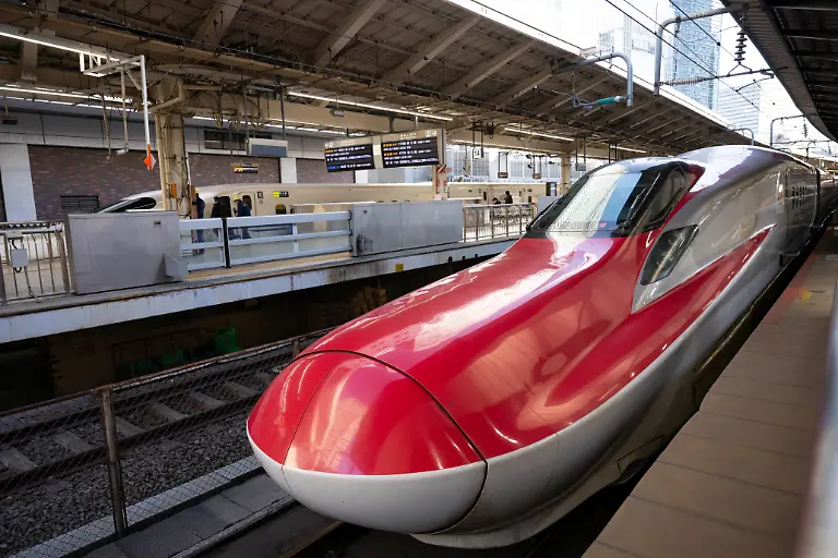 February-28-2023-Tokyo-Japan-A-JR-East-E6-series-E6A-A-A-Shinkansen-built-by-Hitachi-and-Kawasaki-Heavy-Industries-at-Tokyo-Station-with-service-on-the-TAAhoku-Shinkansen-to-Shin-Aomori-station-Tokyo-Station-A-AA-A-AoA-A-A-a-is-a-historic-transportation-hub-in-Japan-serving-as-a-terminal-for-shinkansen-and-local-trains-It-s-also-a-shopping-and-dining-destination-with-restaurants-boutiques-and-a-hotel-in-its-renovated-brick-main-building-Shinkansen-A-aA-A-A-A-A-A-A-is-Japan-s-high-speed-bullet-train-network-connecting-major-cities-Known-for-speed-efficiency-and-comfort-it-is-one-of-the-busiest-and-most-advanced-rail-systems-in-the-world-High-speed-rail-Japan-economy-Eastern-asia-business