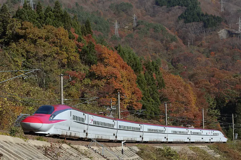 SEMBOKU-JAPAN-NOVEMBER-04-A-E6-Shinkansen-bullet-train-runs-Akabuchi-and-Tazawako-stations-on-November-4-2015-in-Semboku-Akita-Japan