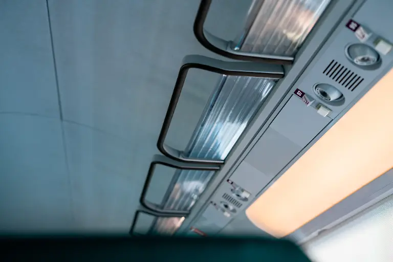 Blurry-photo-of-the-interior-of-a-modern-train-on-the-move-xkwx-al-boraq-background-blur-blurry-cabin-car-carriage-ceiling-city-clean-close-up-comfort-comfortable-commute-empty-indoor-inside-journey-light-luggage-luxury-modern-moroccan-morocco-motion-moving-new-nobody-oncf-public-rail-railroad-railway-reading-light-seats-service-shelf-speed-spotlight-tourism-train-transport-travel-trip-vehicle-view