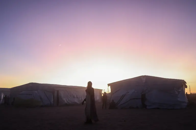 Sudanese-refugees-from-Al-Fashir-displaced-by-ongoing-conflict-in-Sudan-between-the-paramilitary-Rapid-Support-Forces-RSF-and-the-Sudanese-army-gather-at-sunset-at-the-Tine-transit-camp-in-eastern-Chad-November-23-2025-REUTERS-Amr-Abdallah-Dalsh-SEARCH-ABDALLAH-DALSH-SUDAN-SURVIVORS-FOR-THIS-STORY-SEARCH-WIDER-IMAGE-FOR-ALL-STORIES
