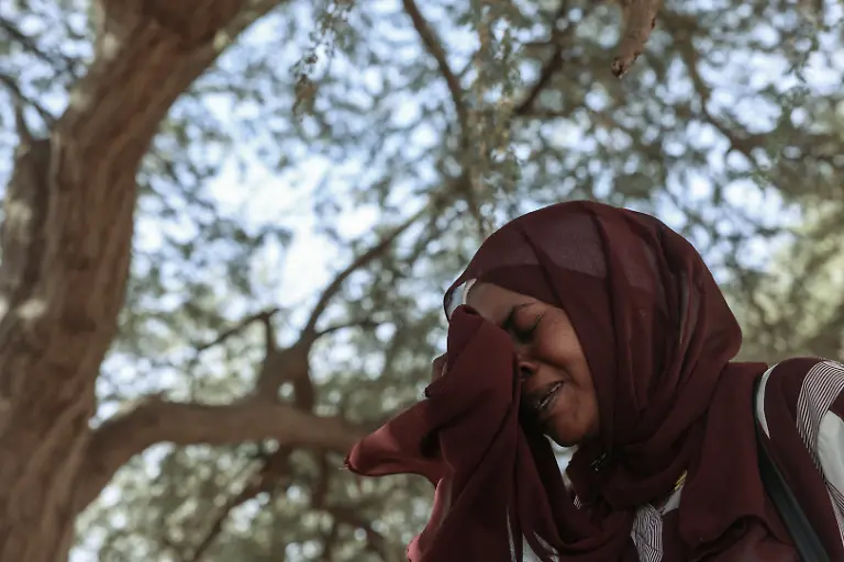 Mona-Mohamed-33-a-Sudanese-refugee-who-fled-Al-Fashir-reacts-during-an-interview-with-Reuters-amid-ongoing-conflict-in-Sudan-between-the-paramilitary-Rapid-Support-Forces-RSF-and-the-Sudanese-army-at-the-Iridimi-refugee-camp-northwest-of-the-town-of-Iriba-in-Wadi-Fira-province-eastern-Chad-November-27-2025-REUTERS-Amr-Abdallah-Dalsh-TPX-IMAGES-OF-THE-DAY-SEARCH-ABDALLAH-DALSH-SUDAN-SURVIVORS-FOR-THIS-STORY-SEARCH-WIDER-IMAGE-FOR-ALL-STORIES