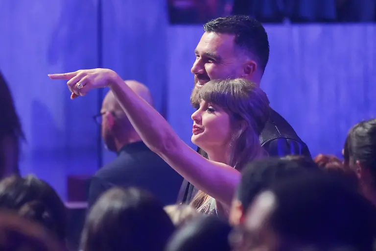 Taylor-Swift-left-and-Travis-Kelce-seen-in-the-audience-during-the-IHeartRadio-Music-Awards-on-Thursday-March-26-2026-at-the-Dolby-Theatre-in-Los-Angeles