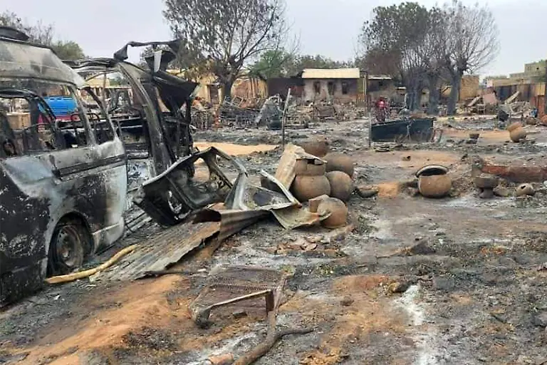 This-picture-taken-on-September-1-2023-shows-a-view-of-destruction-in-a-livestock-market-area-in-al-Fasher-the-capital-of-Sudan-s-North-Darfur-state-The-conflict-between-Sudan-s-army-under-General-Abdel-Fattah-al-Burhan-and-the-paramilitary-Rapid-Support-Forces-RSF-commanded-by-Mohamed-Hamdan-Daglo-spread-in-late-August-2023-to-North-Darfur-state-with-at-least-27-localities-burned-down-by-the-RSF-and-allied-Arab-militias-according-to-the-Humanitarian-Research-Lab-at-the-Yale-School-of-Public-Health