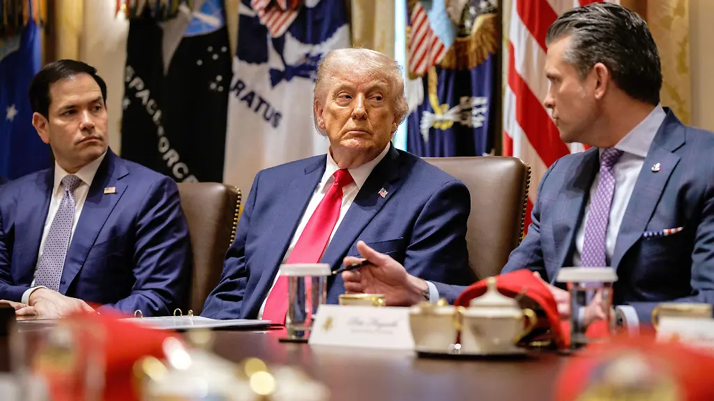 United-States-President-Donald-J-Trump-center-and-US-Secretary-of-State-Marco-Rubio-left-listen-as-United-States-Secretary-of-War-Pete-Hegseth-right-speaks-during-a-Cabinet-meeting-in-the-Cabinet-Room-of-the-White-House-in-Washington-DC-USA-on-May-27-2026-Trump-is-holding-the-meeting-with-members-of-his-Cabinet-as-a-the-U-S-and-Iran-creep-closer-to-a-deal