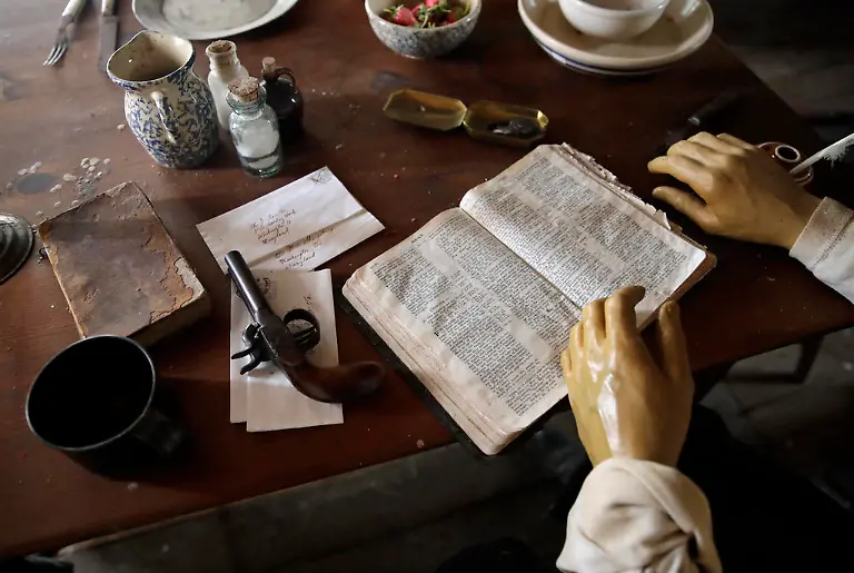 In-this-Feb-8-2017-photo-a-gun-a-bible-and-other-items-sit-in-front-of-a-mannequin-depicting-abolitionist-John-Brown-right-in-the-restored-farmhouse-where-Brown-launched-his-ill-fated-1859-seizure-of-a-federal-armory-in-Dargan-Md-Historians-cite-the-failed-raid-by-Brown-and-18-fervent-followers-in-nearby-Harpers-Ferry-W-Va-as-the-opening-salvo-in-the-Civil-War-because-it-incited-strong-passions-especially-in-the-slave-holding-South-The-farmhouse-was-designated-a-national-historic-landmark-in-1973