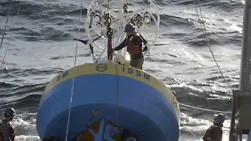 Pioneer, readying buoy for deployment image