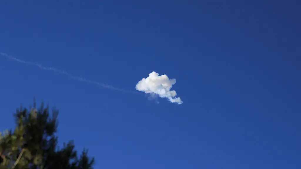 Smoke-from-an-explosion-in-the-sky-after-Israel-s-Iron-Dome-anti-missile-system-intercepted-an-Iranian-missile-as-seen-from-Jerusalem-June-8-2026