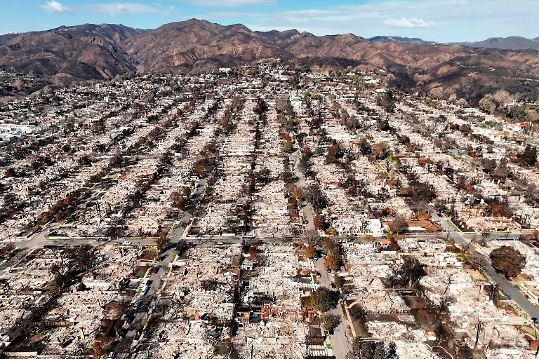 FILE-The-devastation-from-the-Palisades-Fire-is-shown-in-an-aerial-view-of-the-Pacific-Palisades-neighborhood-of-Los-Angeles-Monday-Jan-27-2025-AP-Photo-Jae-C