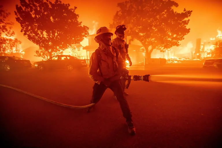 Firefighters-battle-the-Palisades-Fire-as-it-burns-multiple-structures-in-the-Pacific-Palisades-neighborhood-of-Los-Angeles-Tuesday-Jan-7-2025
