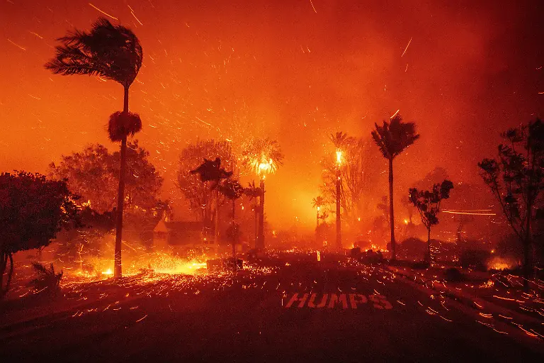 The-Palisades-Fire-ravages-a-neighborhood-amid-high-winds-in-the-Pacific-Palisades-neighborhood-of-Los-Angeles-Tuesday-Jan-7-2025