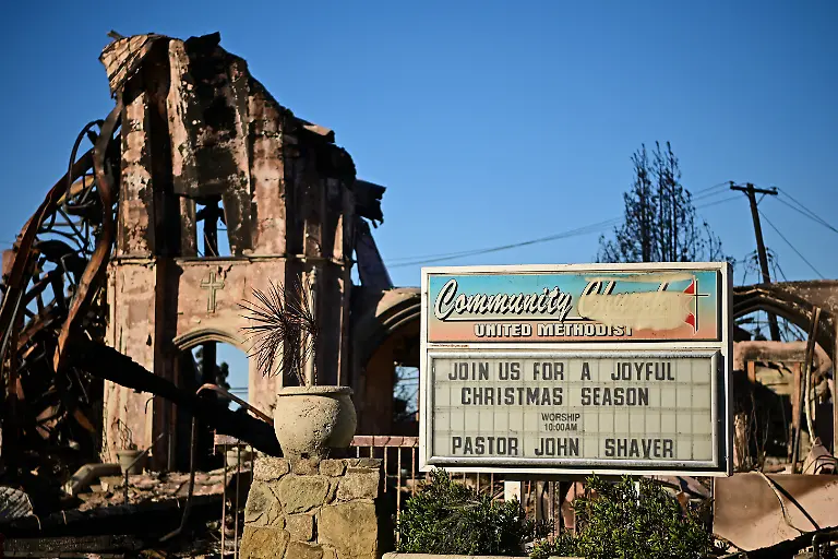 The-Community-United-Methodist-Church-of-Pacific-Palisades-destroyed-by-the-Palisades-Fire-is-pictured-in-the-Pacific-Palisades-neighborhood-of-Los-Angeles-California-on-January-13-2025-Firefighters-were-battling-massive-wildfires-on-January-13-that-have-ravaged-Los-Angeles-and-killed-at-least-24-people-with-officials-warning-of-incoming-dangerous-winds-that-could-whip-up-the-blazes-further